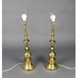 A pair of large and impressive gilt metal table lamps 67cm h x 19cm