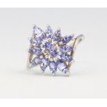 A 9ct white gold tanzanite cluster ring size R, 3.3 grams