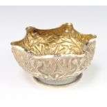 An Indian silver floral shaped bowl with leaf decoration raised on a spiral stem 190 grams