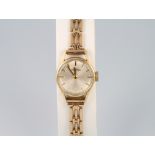 A lady's 9ct yellow gold Roamer wristwatch, gross 14.3 grams The watch does not wind and is not