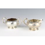 A Sterling silver sugar bowl and cream jug 310 grams