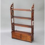 A Chippendale style mahogany 4 tier wall shelf with pierced panels to the side, the base fitted 4