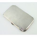 A silver engine turned cigarette case Birmingham 1913, gross 160 grams The engraving is worn