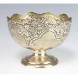 A silver repousse rose bowl with scroll decoration Birmingham 1923 265 grams 15cm