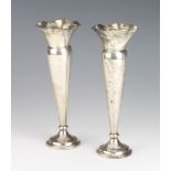 A pair of silver tapered posy vases Birmingham 1917, 21cm Both have minor dents