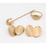 A pair of 9ct yellow gold cufflinks, a ditto ring and a tie pin, 9 grams