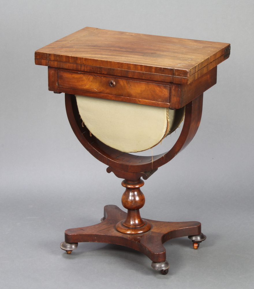 A William IV mahogany games/work table with flip over swivel top, fitted 1 drawer above U shaped