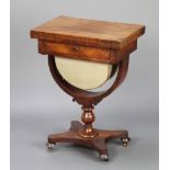A William IV mahogany games/work table with flip over swivel top, fitted 1 drawer above U shaped