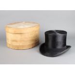 A gentleman's black silk top hat by W A Smalley of Nottingham, size 7 1/4, complete with hat box