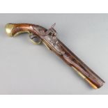 An 18th/19th Century percussion pistol with 23cm circular barrel, the lock with queens crown, having