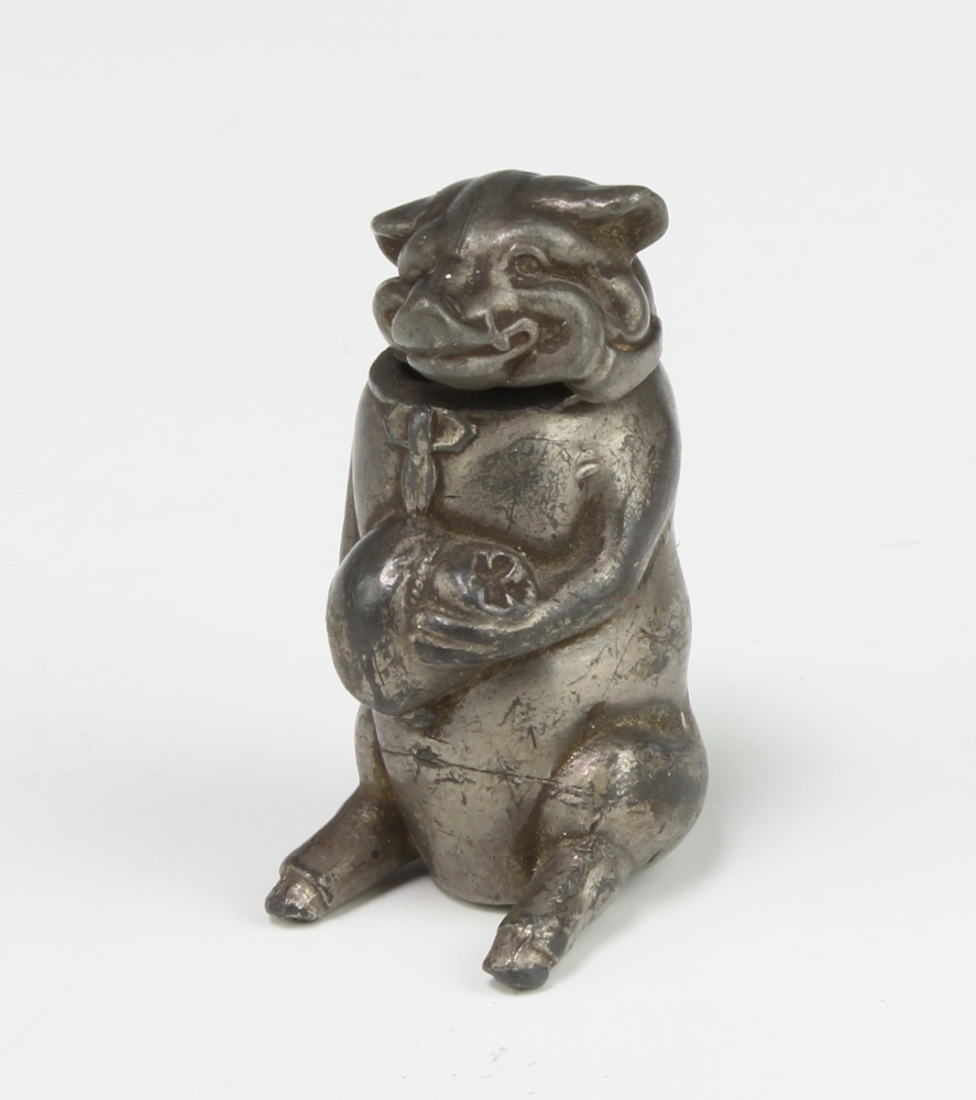 An Edwardian plated vesta in the form of a seated pig