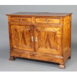 A 19th Century French fruitwood cabinet, fitted two long drawers above double cupboard, raised on