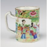 A Cantonese mug decorated with figures on a pavillion terrace with a rustic handle 9cm There are