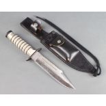 A Fox Zambelz knife with 19cm blade complete with leather scabbard and sharpening stone