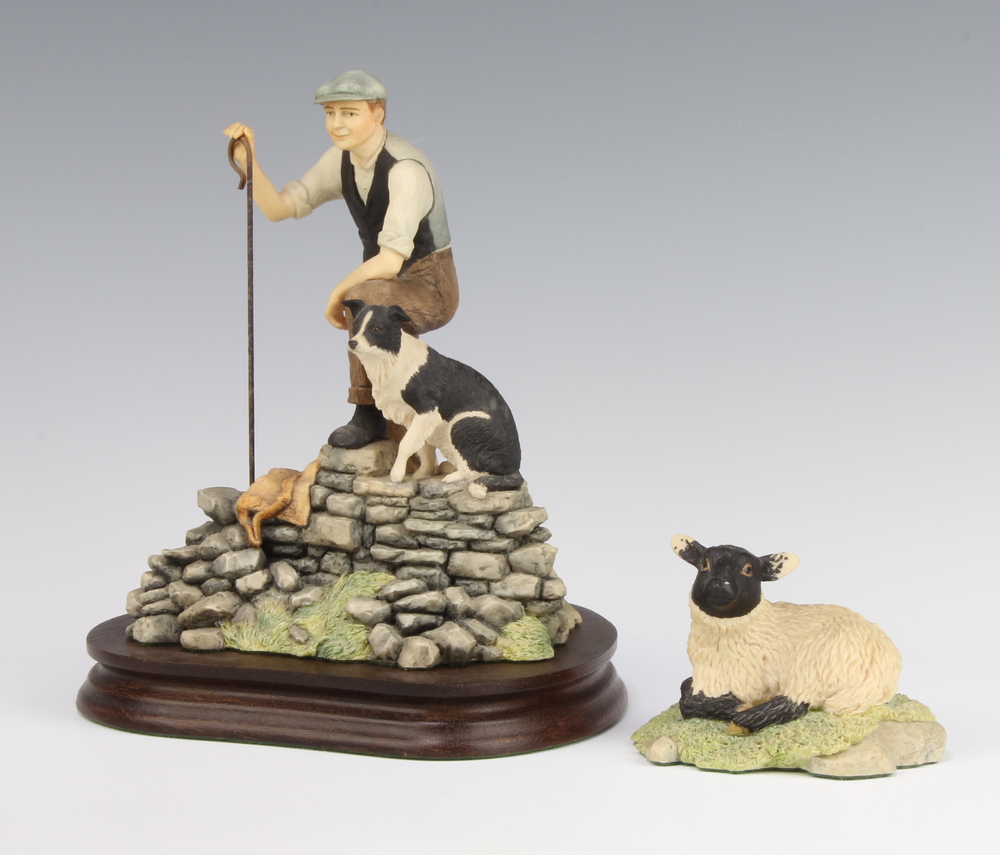 A Border Fine Arts figure of a shepherd and sheep dog 17cm on a wooden stand together with a ditto