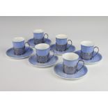 Six Shelley coffee cups and saucers contained in pierced silver holders, Birmingham 1938 1 coffee