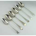 Six early Georgian silver table spoons mixed dates, 363 grams