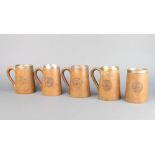 A set of 5 Indian carved hardwood tankards with metal liners decorated The Badge of the 7th Punjab