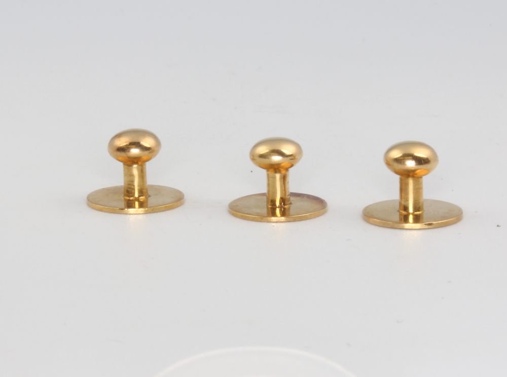 Three 18ct yellow gold dress studs, 4 grams