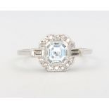 A platinum aquamarine and diamond Art Deco style ring, aquamarine approx. 0.7ct the diamonds 0.