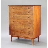 John Herbert for A Younger Ltd, a mid Century teak chest of 6 drawers with turned handles, raised on