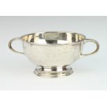 A silver 2 handled bowl of plain form, Sheffield 1965, 163 grams