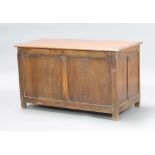 A 19th Century oak coffer of panelled construction with hinged lid 60cm h x 105cm w x 53cm d