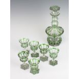 A Bohemian green and clear glass octagonal decanter, 6 sherry glasses and 1 tott The decanter