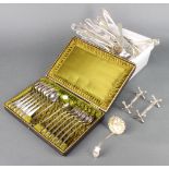 A cased set of plated teaspoons and sugar tongs and minor plated wares