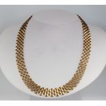 A 9ct yellow gold tapered link necklace 47.1 grams
