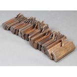 Twenty various 19th Century moulding planes