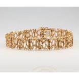 A 9ct yellow gold bark finished gate bracelet 19.5 grams