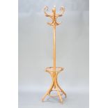 An Edwardian turned beech and bentwood cafe style hat and coat stand marked 735Z, 196cm h x 38cm