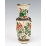 A Chinese crackle glazed vase decorated with insects and flowers 24cm