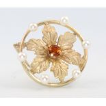 A 9ct yellow gold gem and pearl floral brooch 4.4 grams