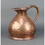 A George IV copper harvest measure 30cm h x 29cm diam. with London mark to the top Some dents to the