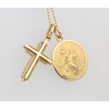 A 9ct yellow gold St Christopher pendant, a cross and two chains, 6 grams