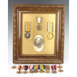 Family group medals, a trio to 78512 DVR.H.N.Hollway RFA framed with photograph of recipient, a