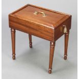 A Victorian rectangular mahogany bidet with sliding top and plush interior, raised on later turned