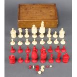 A 19th Century red and white stained and carved bone part chess set All heavily chipped, the red