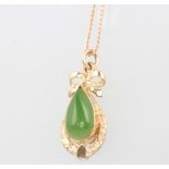 A 9ct yellow gold jade pendant and chain