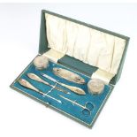 A cased silver engine turned 6 piece manicure set Birmingham 1922