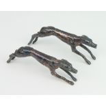 A pair of Edwardian silver plated novelty knife rests in the form of greyhounds 9cm