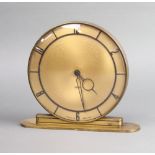 A Smiths 1930's Art Deco mantel timepiece with gilt dial and Arabic numerals, the reverse marked