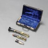 A Court and Son clarinet no.10150, cased There is a chip to the end of the bell