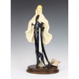 A Capodimonte figure of a lady wearing a cape signed A Santini 46cm