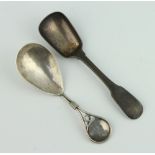 A stylish silver caddy spoon London 1990 and a Georgian ditto 59 grams