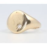 A gentleman's 9ct yellow gold diamond signet ring 9 grams, size V