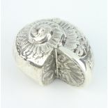 A modern repousse Sterling silver pill box in the form of a shell, 4cm, 21 grams