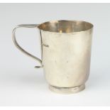A silver christening mug of plain form Sheffield 1919, 8cm, 145 grams